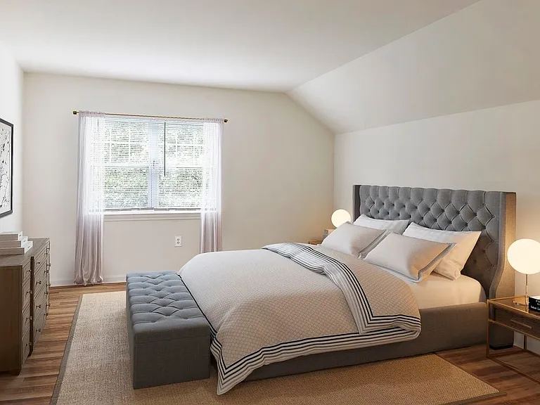 Renovated Package I bedroom with hard surface plank flooring