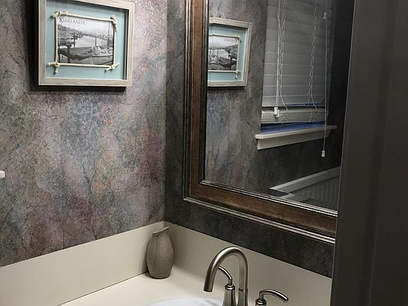 Half bath right off the laundry room ( great for wet feet fr