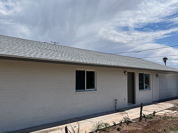 View of Unit #2 from Unit #1 front area.