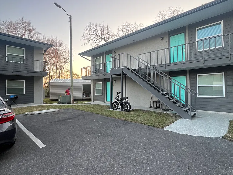 This unit is located in the center of the property, upstairs.