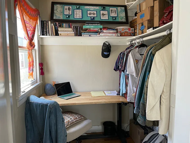 One of two closets that have windows and are large enough for a home office