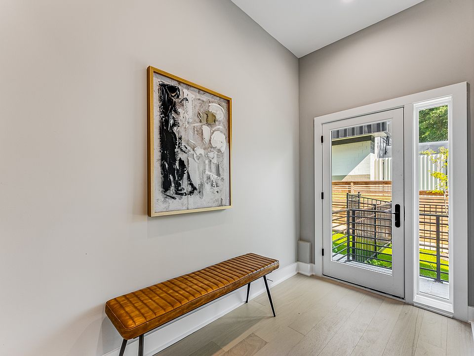 Front door looking out to private fenced yard