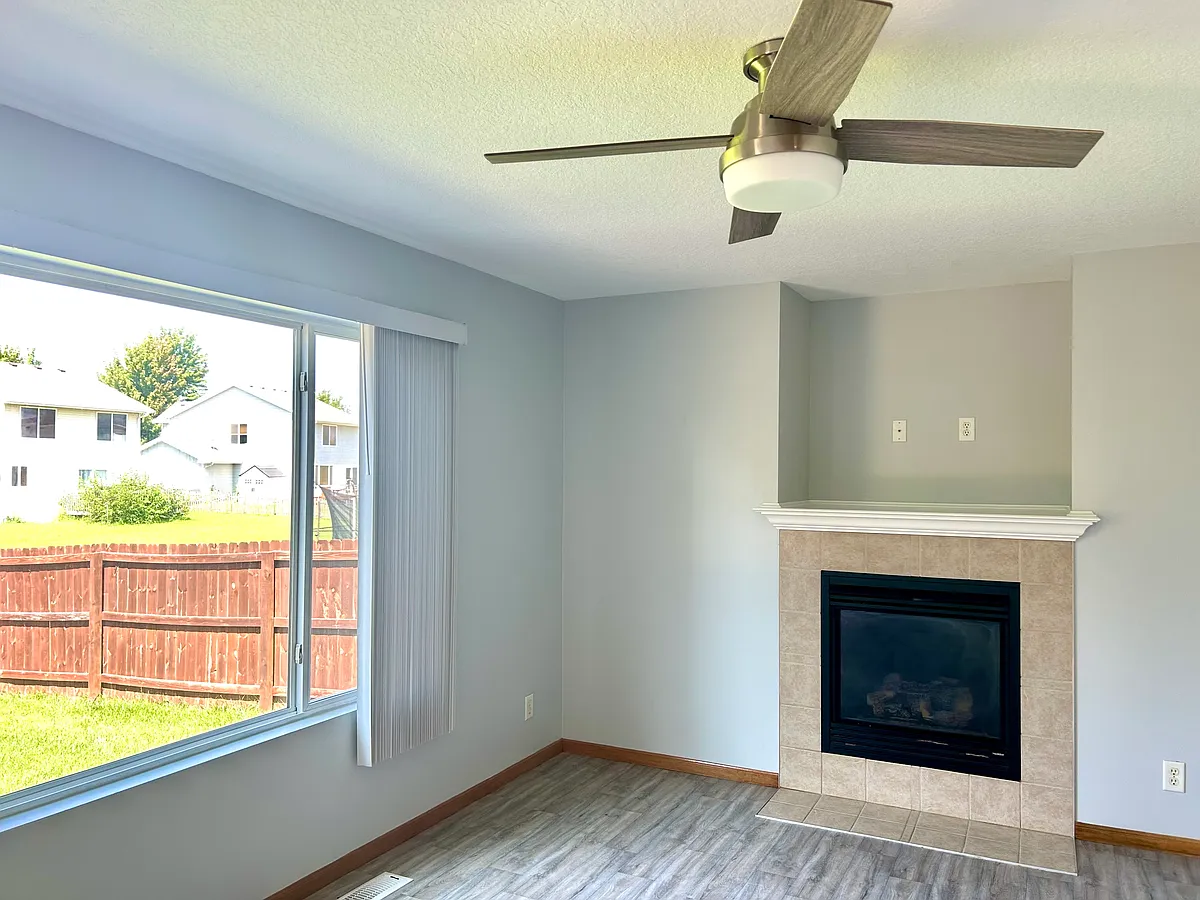Living room: new vinyl floors, new paint and new electrical throughout the house - 810 SE Willowbrook Dr