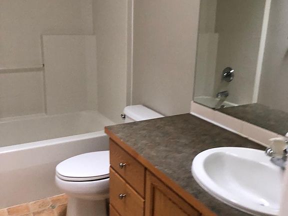 Upstairs Hall full bathroom with skylight