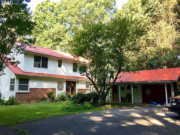 Back of house, wrap driveway