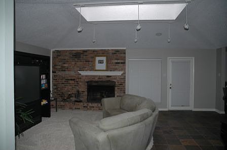 Family room with custom furniture.  Curl up on the sofa and get comfy!
