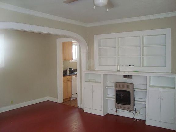 living room with built-in shelving