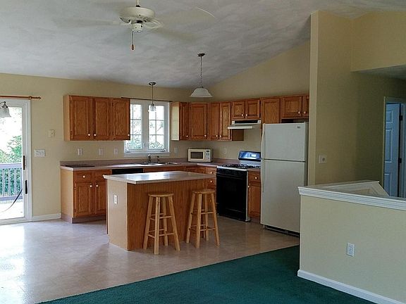 Cathedral ceiling kitchen with gas range, diswasher, disposa