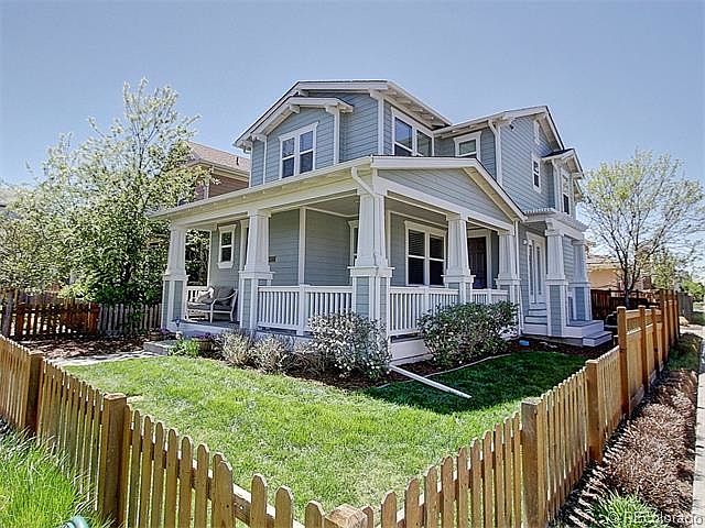 Wrap around porch with second entrance to kitchen/dining roo