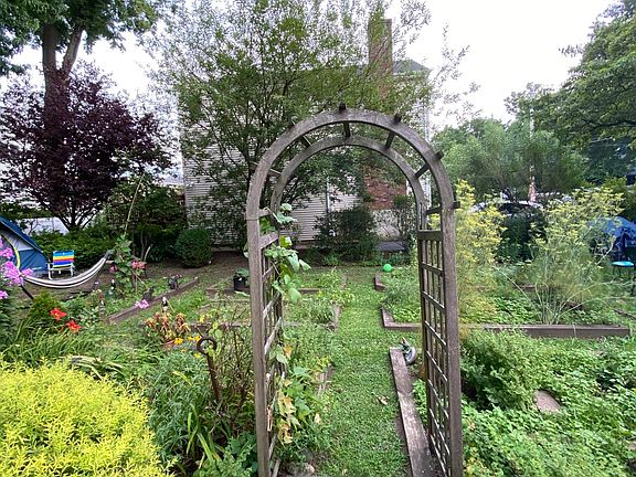Lots of outdoor space including raised beds for gardening.