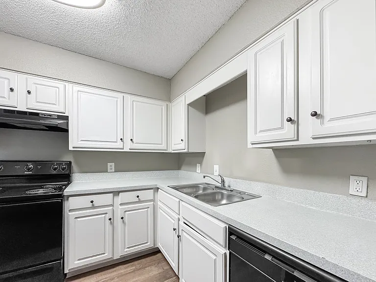 Bright kitchen space combining modern convenience with classic style.