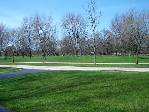 View of the Midland County Club from your front windows with unconfined spaces and unobstructed views.
