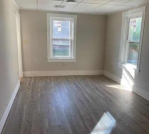 Living room, new windows and flooring entire apartment.