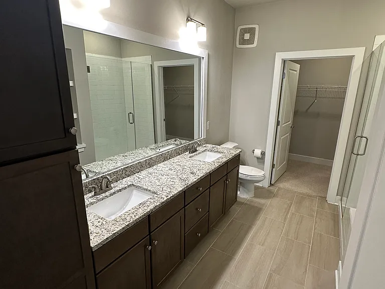Primary bathroom with double vanities