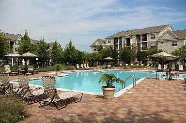 Community pool with lots of seating