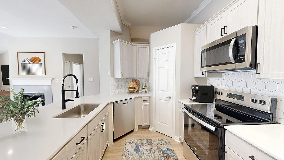 Modern Newly Renovated Kitchen - Lakeside at Coppell Apartments