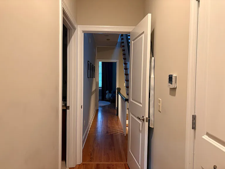 Upper-Level Hallway Leading to Primary Suite