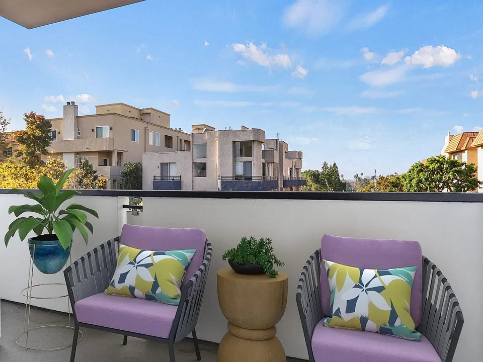 Upper-Level Patio with Skyline Views