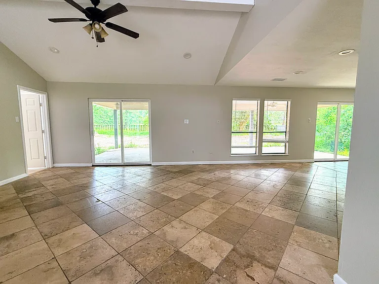 Expansive open concept layout. Beautiful tile flooring throughout the entryway and living areas for easy maintenance.