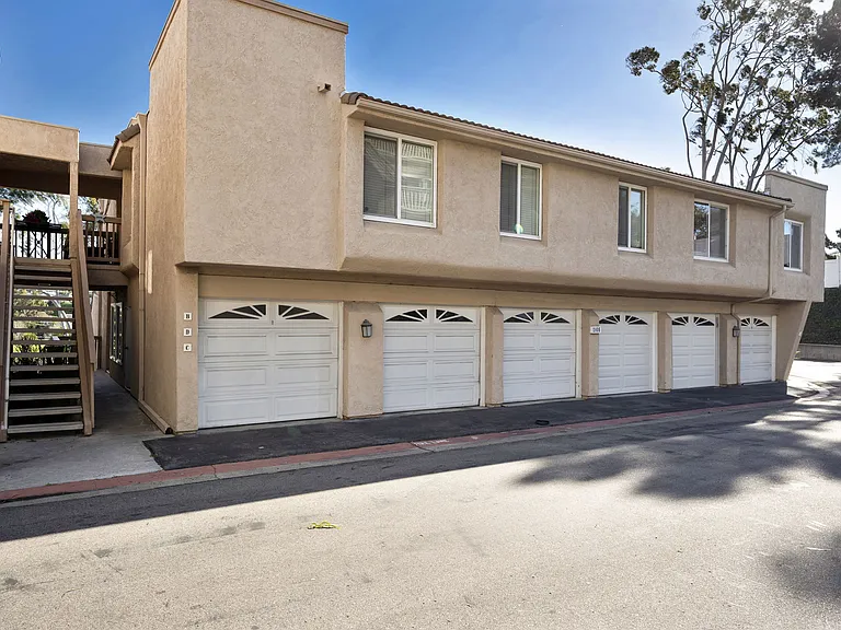 Front building with PIN for garage door
