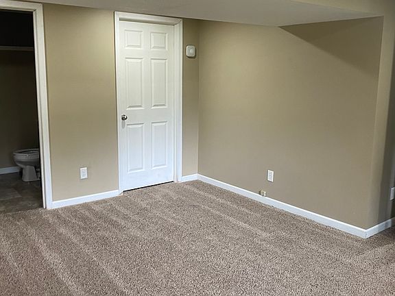 lower level family room - 
shower bath - laundry room