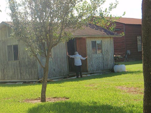 Grandma at tool shed