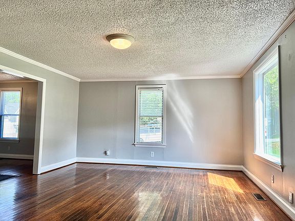 Living Room area doorway from entry and entry to dining room
