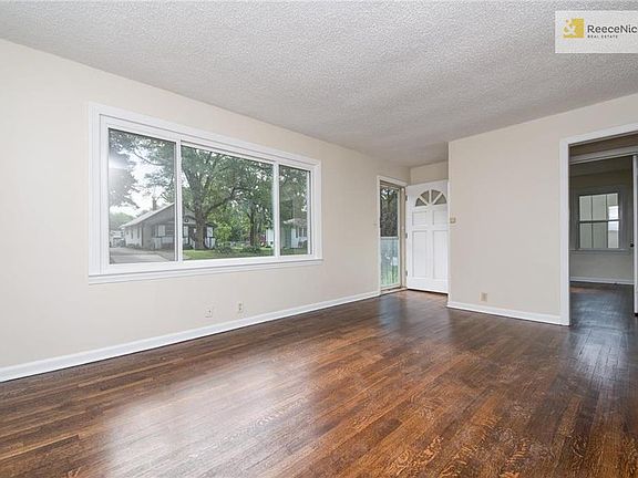 FRONT ROOM FROM KITCHEN DOORWAY
