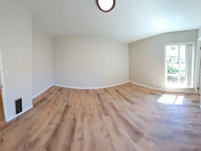 Wide view of bedroom