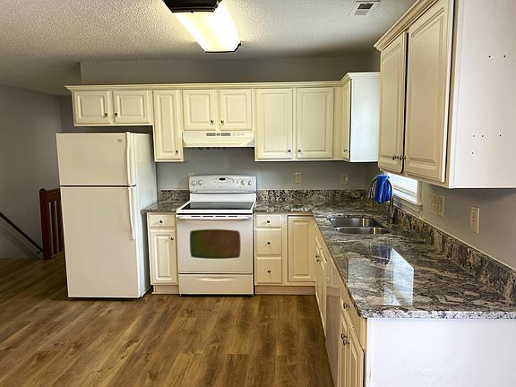 Fridge with Ice Maker, smooth top Range, and brand new Dishwasher, Sink and Faucet.