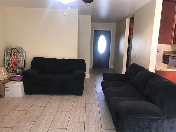 View of front door from living room