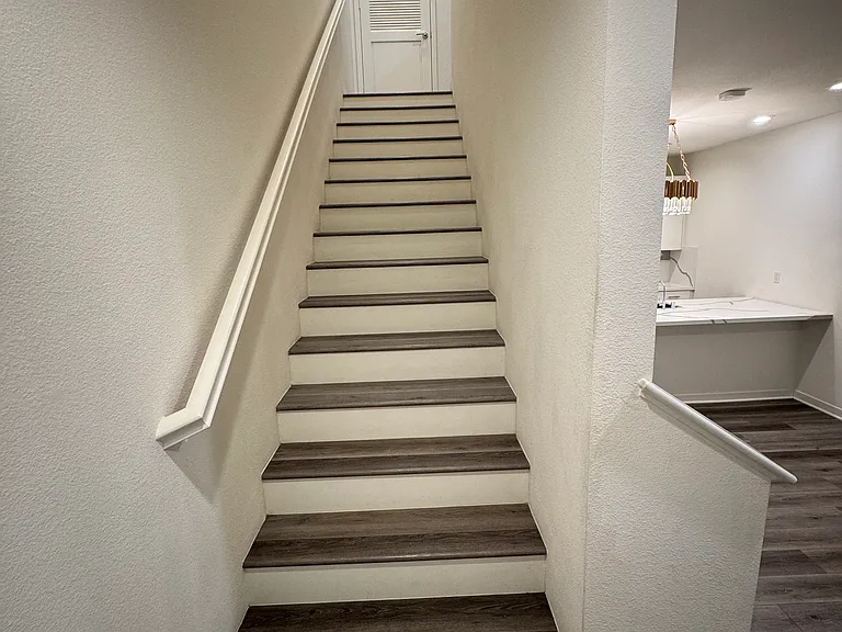 Second staircase leading to third floor