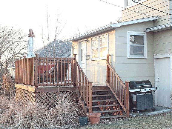 Large deck and back entrance with close driveway access