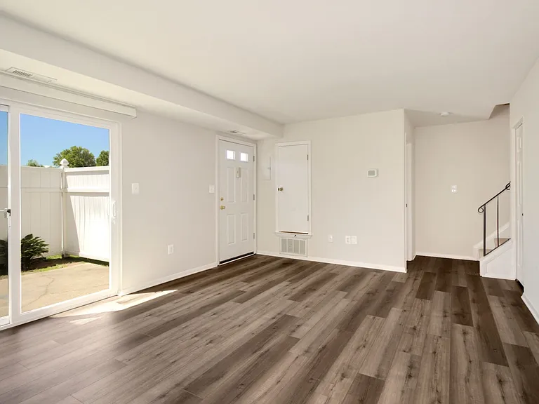 Updated Townhome - Living Area, Entry, & Patio