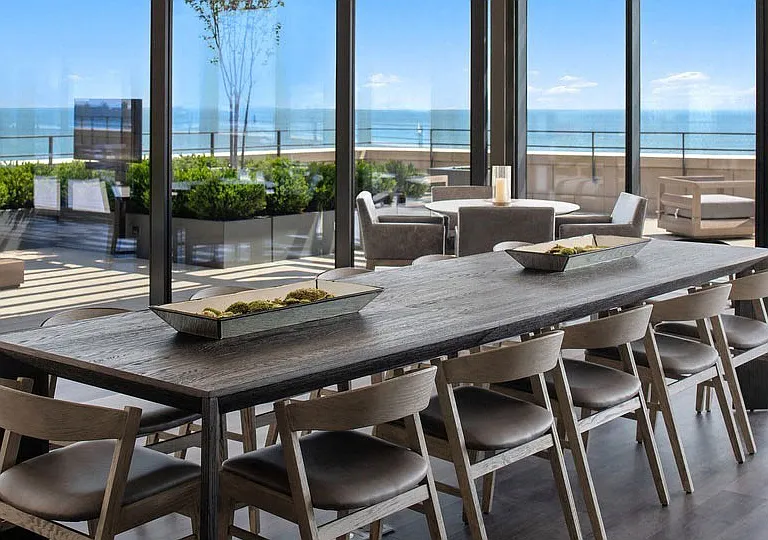 The private roof top club features a commercial kitchen, bar and beverage center, perfect for hosting an unforgettable evening.