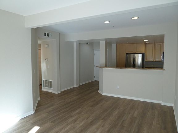 Recently painted & Luxury Vinyl Plank flooring throughout spacious & well lighted Living Room