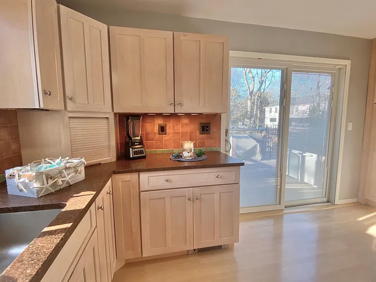 Full kitchen with dishwasher, microwave air fryer, ninja, coffee maker, french door fridge.