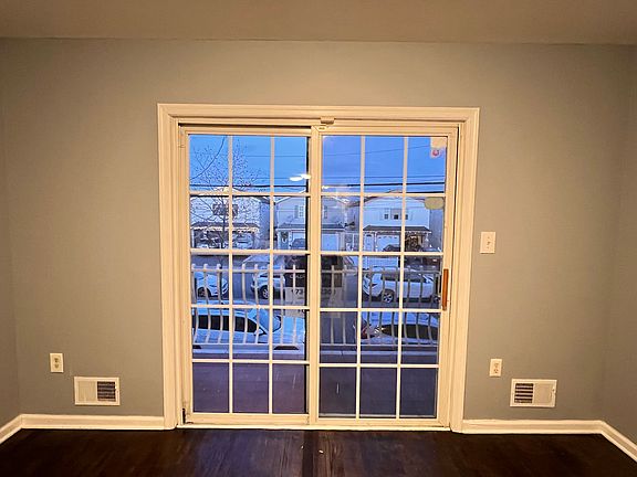BALCONY DOOR (VIA LIVING ROOM)