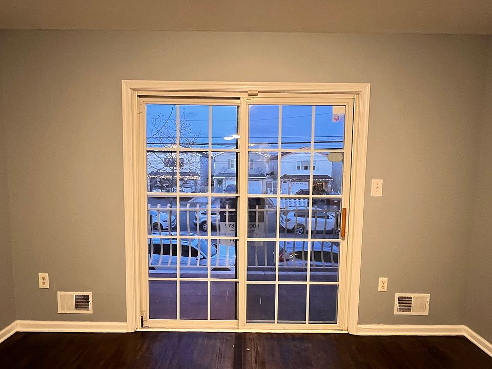 BALCONY DOOR (VIA LIVING ROOM)
