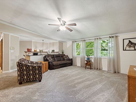 Large living with open concept dining/kitchen.