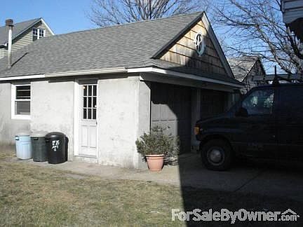 Downstairs kitchen
						:
						Upstairs has same layout with similar cabinets