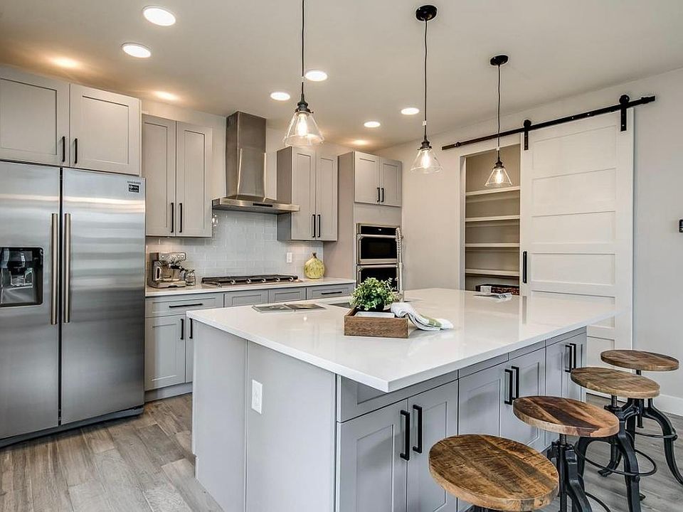 Kitchen with view of walk-in pantry