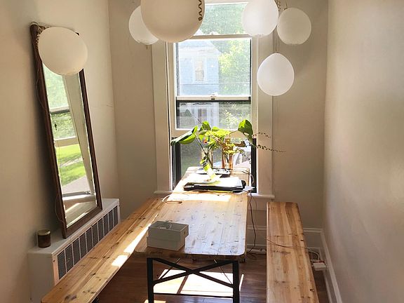 Nook at the end of the hallway makes a great little dining area.