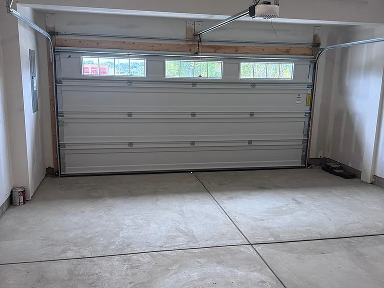 Garage
Attached two-car garage with extra storage space