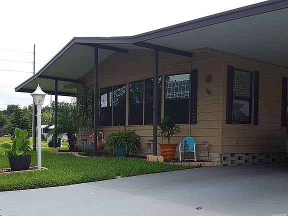 Front of house with meticulous landscaping