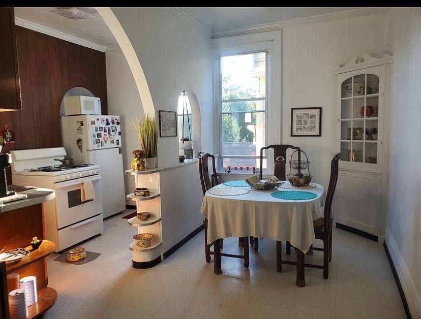 Kitchen with stove and refrigerator included