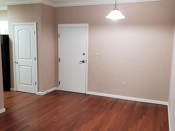 View of Dining Rm, Front door, and kitchen to the left
