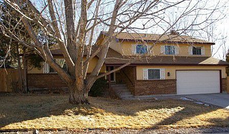 Front of house with mature tree