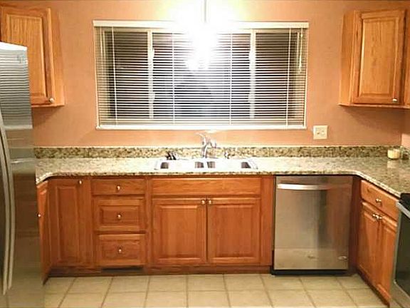 Kitchen. Welcome to your updated kitchen!!  Beautiful granite counter tops, cabinets, and stainless steel appliances!!
