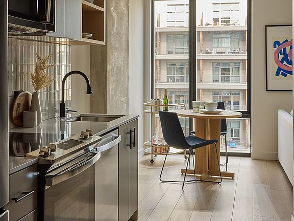 Quartz Countertops and Tile Backsplashes